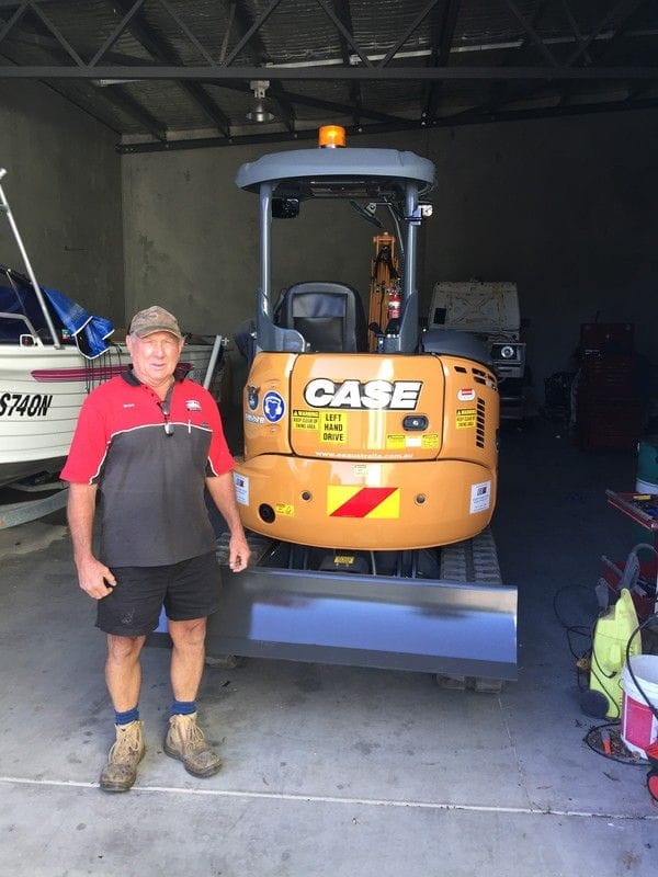 Damien Hicks taking delivery of his new Case CX27B